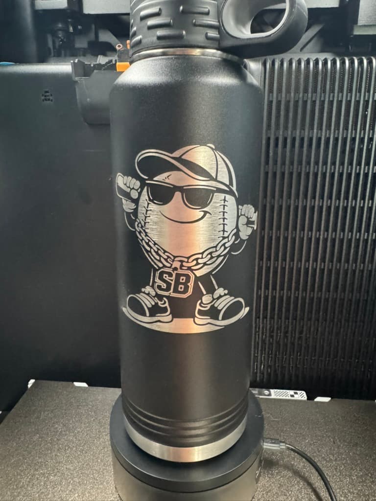 Premium Laser Engraving — Precision engraving on metal, tumblers, and sports equipment.